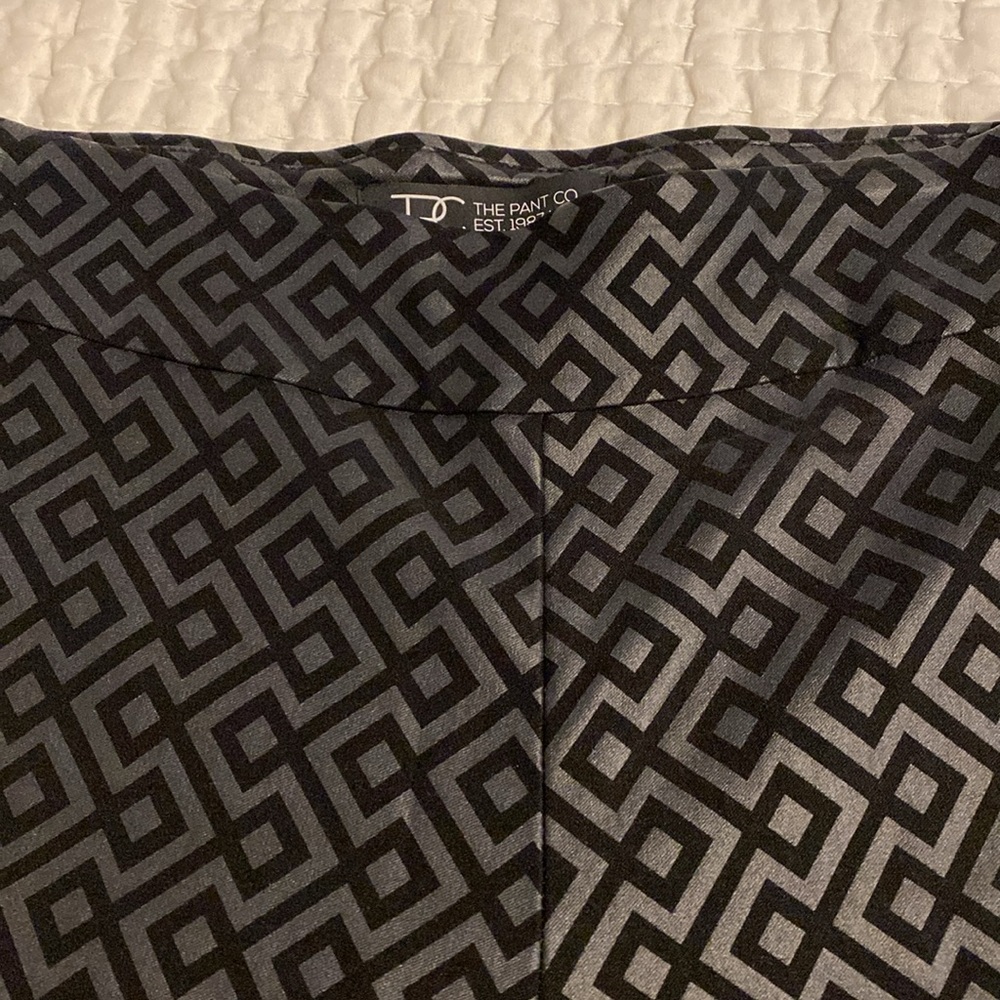 Black & silver pull on pants. Size 10. Excellent condition.